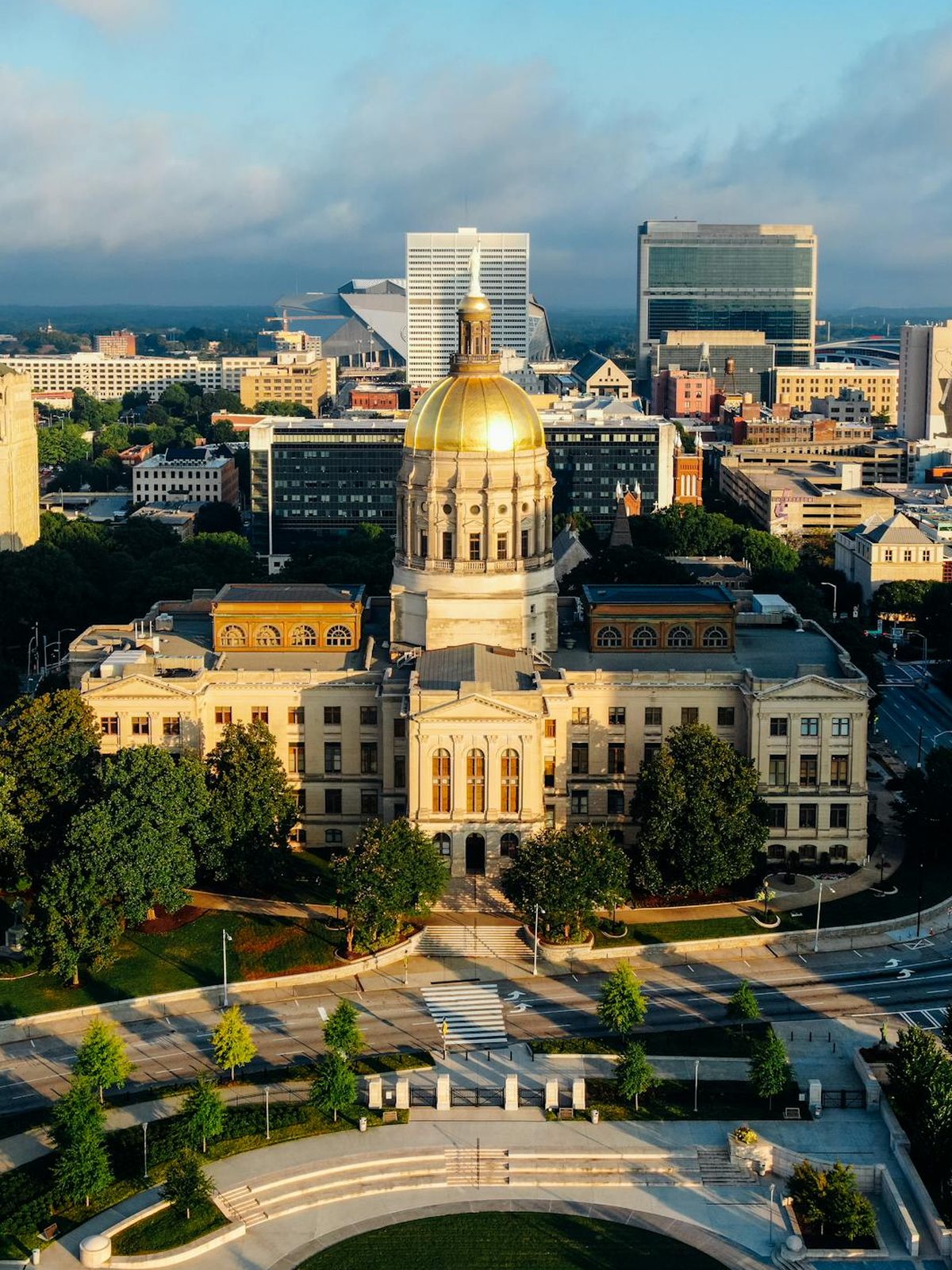 The gold dome of the Georgia State Capitol in downtown Atlanta at sunrise